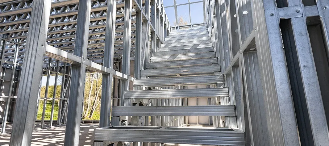 Steel staircase and landing inside a light gauge steel framed building