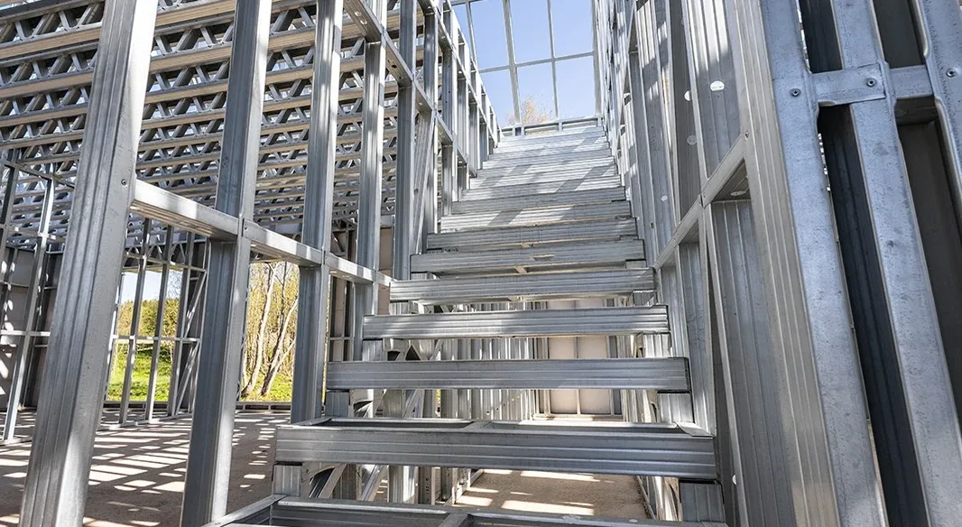 Steel staircase and landing inside a light gauge steel framed building