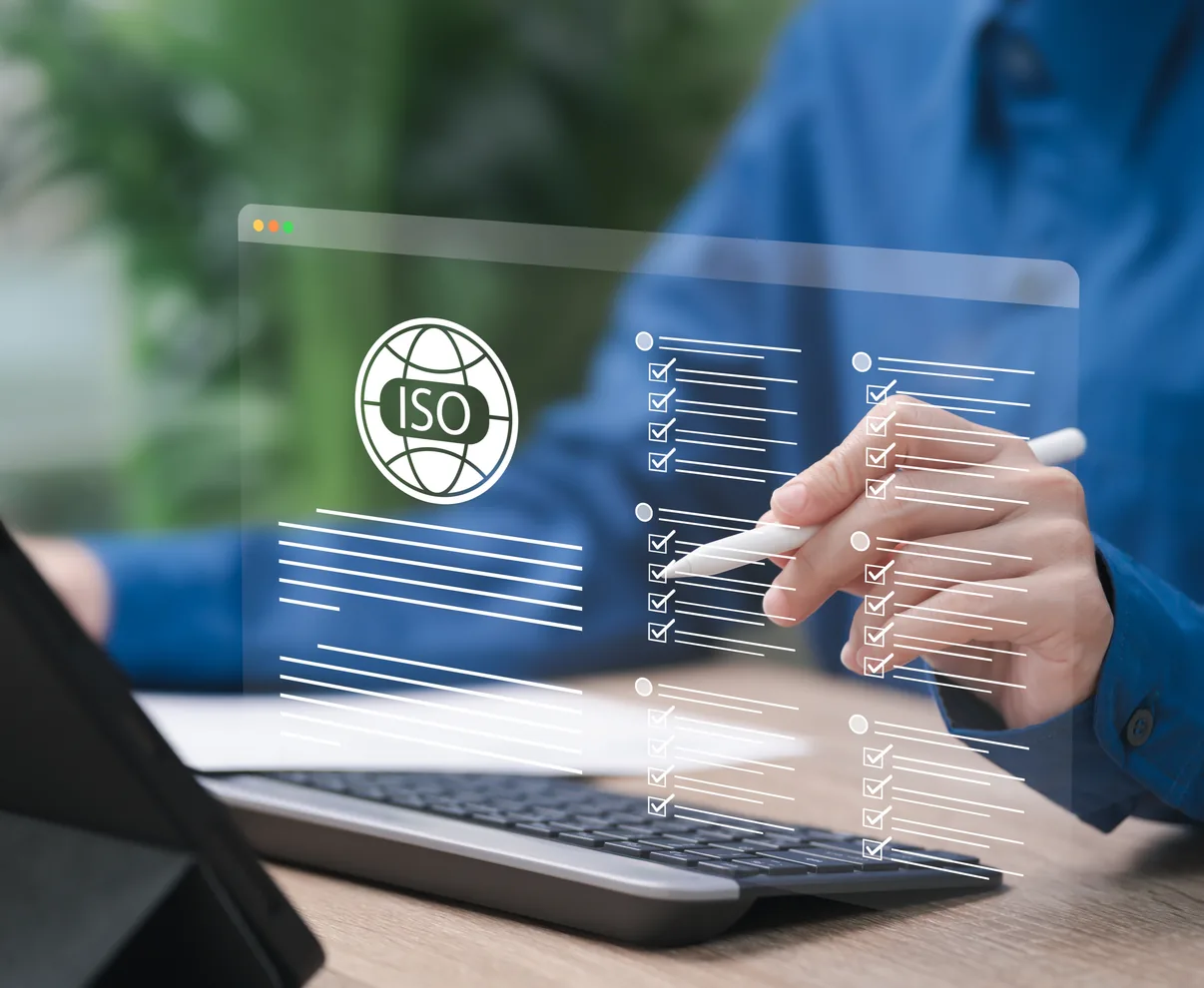 Person using a tablet showing an ISO certification checklist